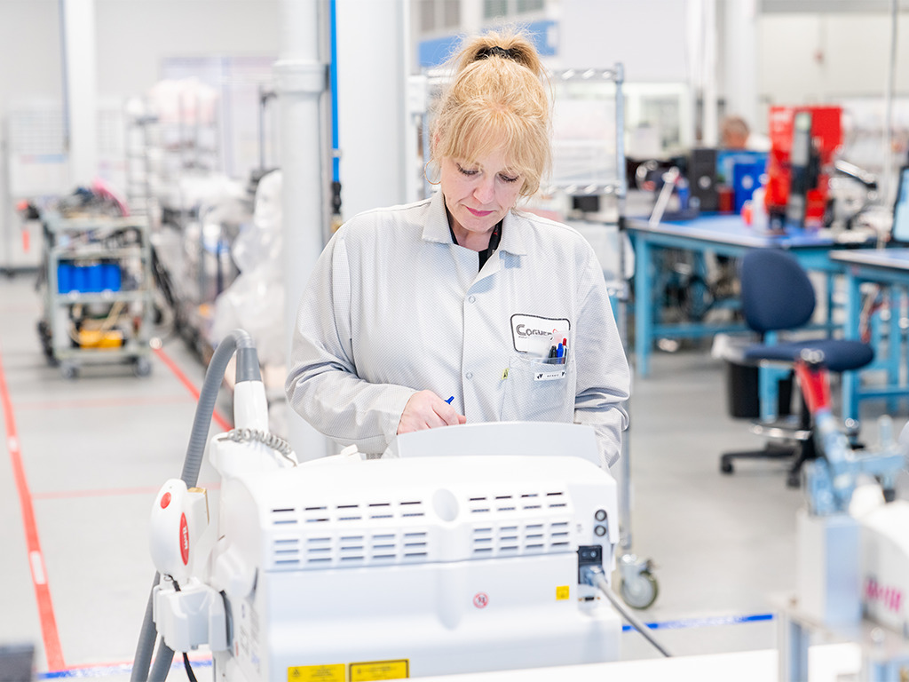 Cogmedix associate working on production floor