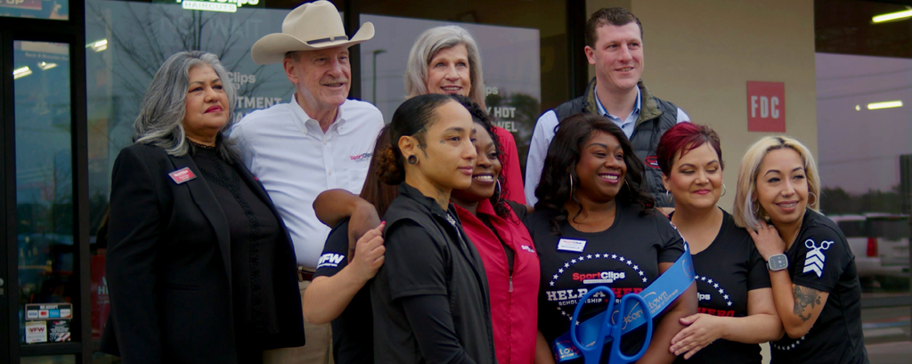 Stylists and Employees at Ribbon Cutting at store TX123