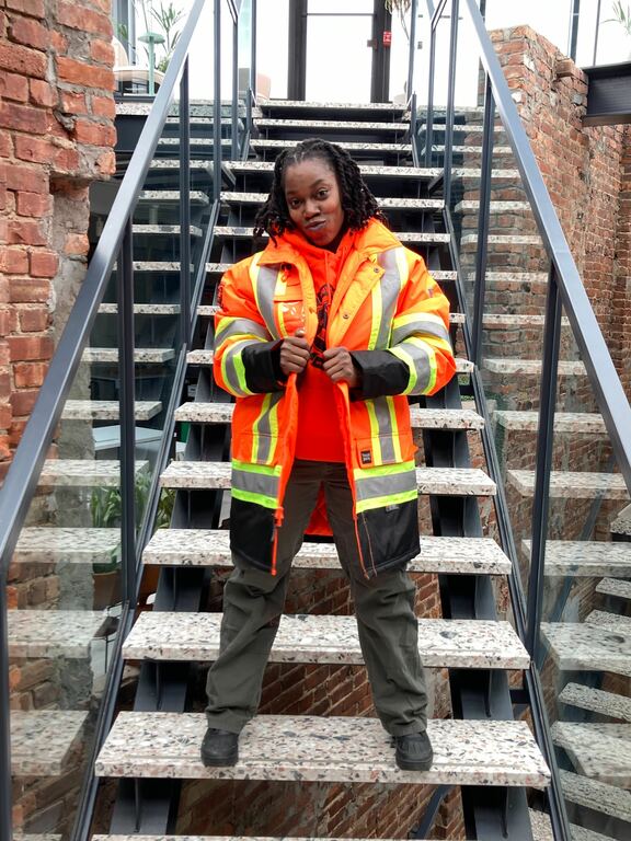 A staff member in uniform at the office.