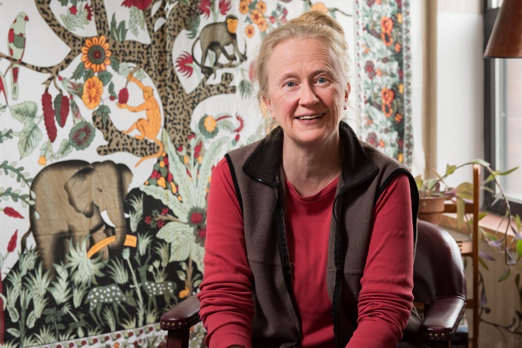 Staff person smiling in office