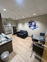 Spacious break room for staff with full size fridge