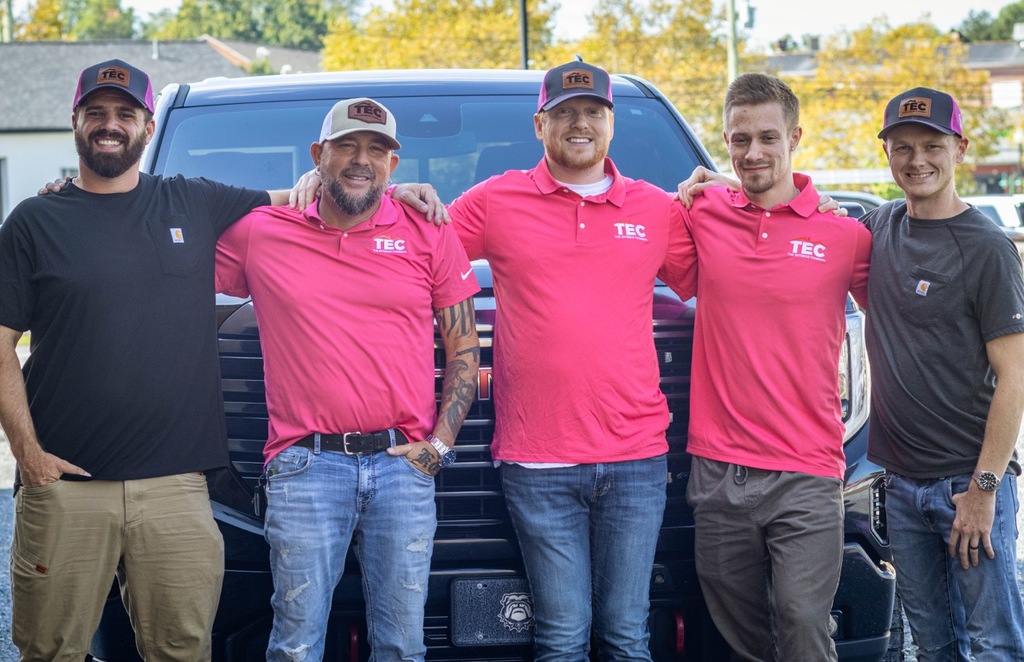 TEC Employees Sporting Breast Cancer Awareness Polos