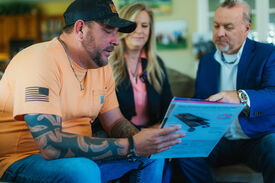 Project Manager showcasing Owens Corning with customers