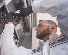 Tech working on wiring