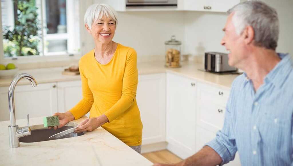 Family smiling at home
