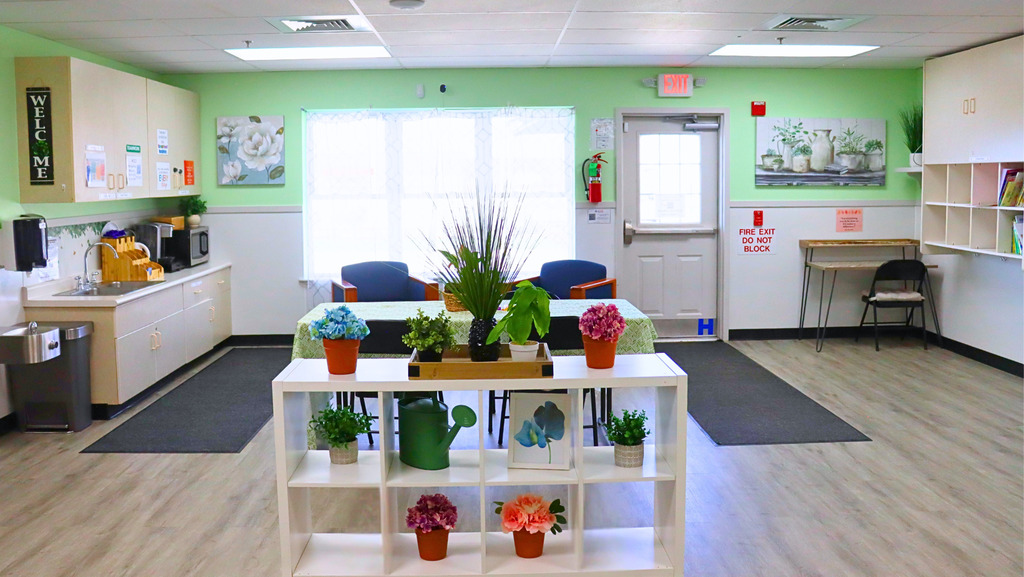 Cozy staff lounge stocked with snacks and drinks