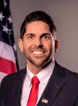 Joel Headshot (Office)-IMAGE SIZE SMALLER.jpg