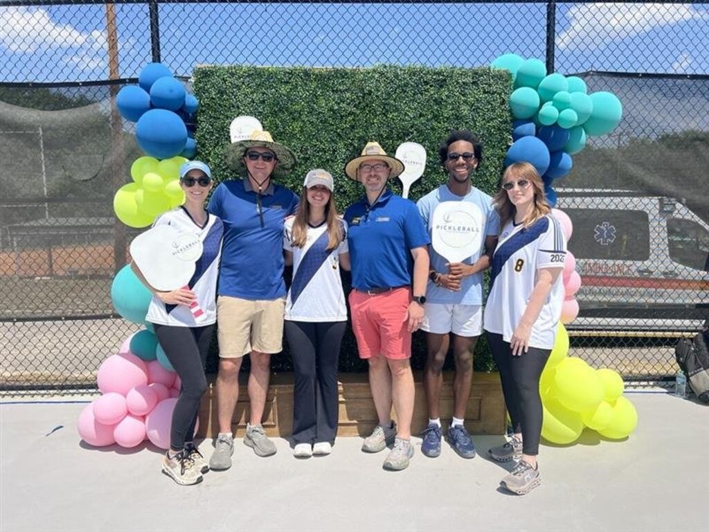 ProMotion team members at a community event